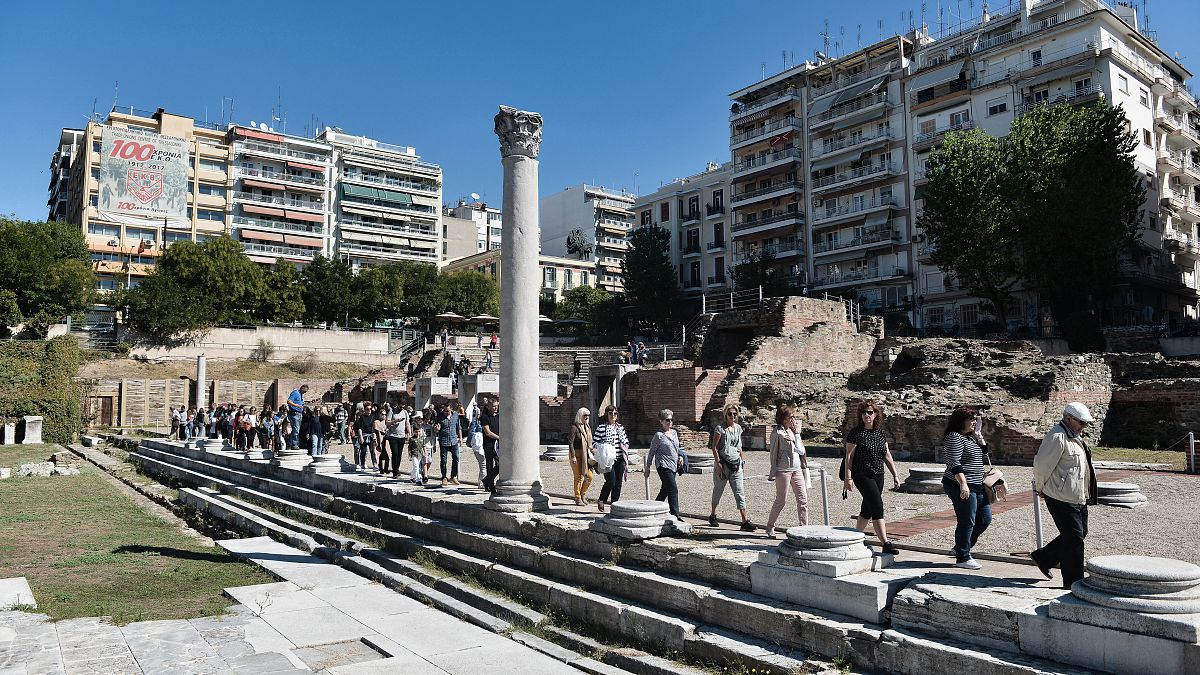 People in Thessaloniki protest against the removal and repositioning of antiquities found during the construction of the Venizelos Metro Station.