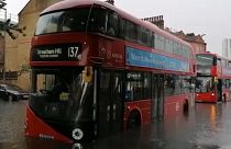 Cars and buses stuck as London roads flood in storm
