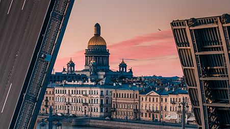 The English embankment and dome of St Isaacs Cathedral, St Petersburg