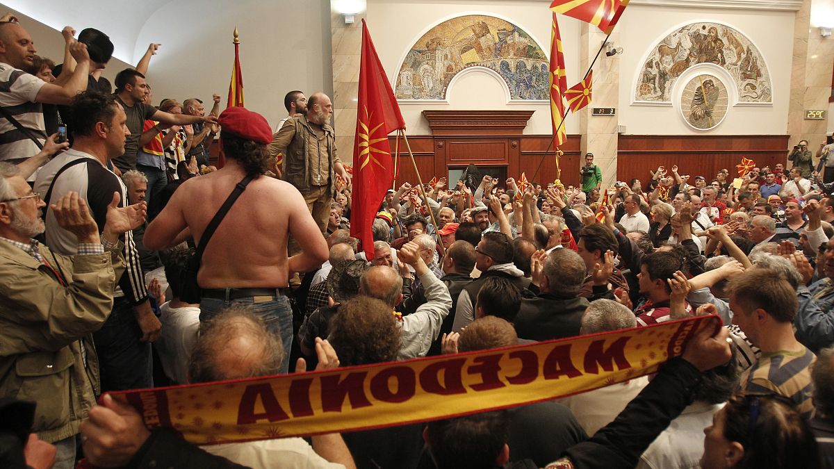 Scores of protesters broke through a police cordon and entered Macedonian parliament in April 2017.
