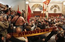 Scores of protesters broke through a police cordon and entered Macedonian parliament in April 2017.