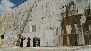 Ganina Yama Monastery Quartet singing down in marble quarry.