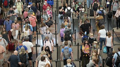 Travellers queue at security checkpoint, Denver International Airport, 16 June 2021 Travellers queue at security checkpoint, Denver International Airport, 16 June 2021