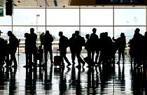Passageiros no aeroporto de Salt Lake City, nos Estados Unidos