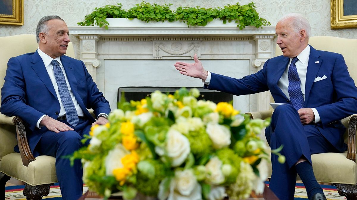 President Joe Biden, right, and Iraqi Prime Minister Mustafa al-Kadhimi during their meeting in the Oval Office of the White House in Washington, July 26, 2021. 