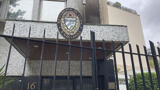 The front entrance of the Cuban Embassy was visibly damaged.