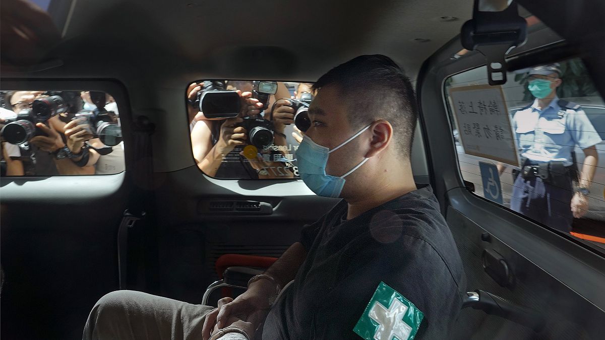 Tong Ying-kit arrives at court in a police van in Hong Kong in July 2020.