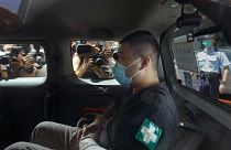 Tong Ying-kit arrives at court in a police van in Hong Kong in July 2020.