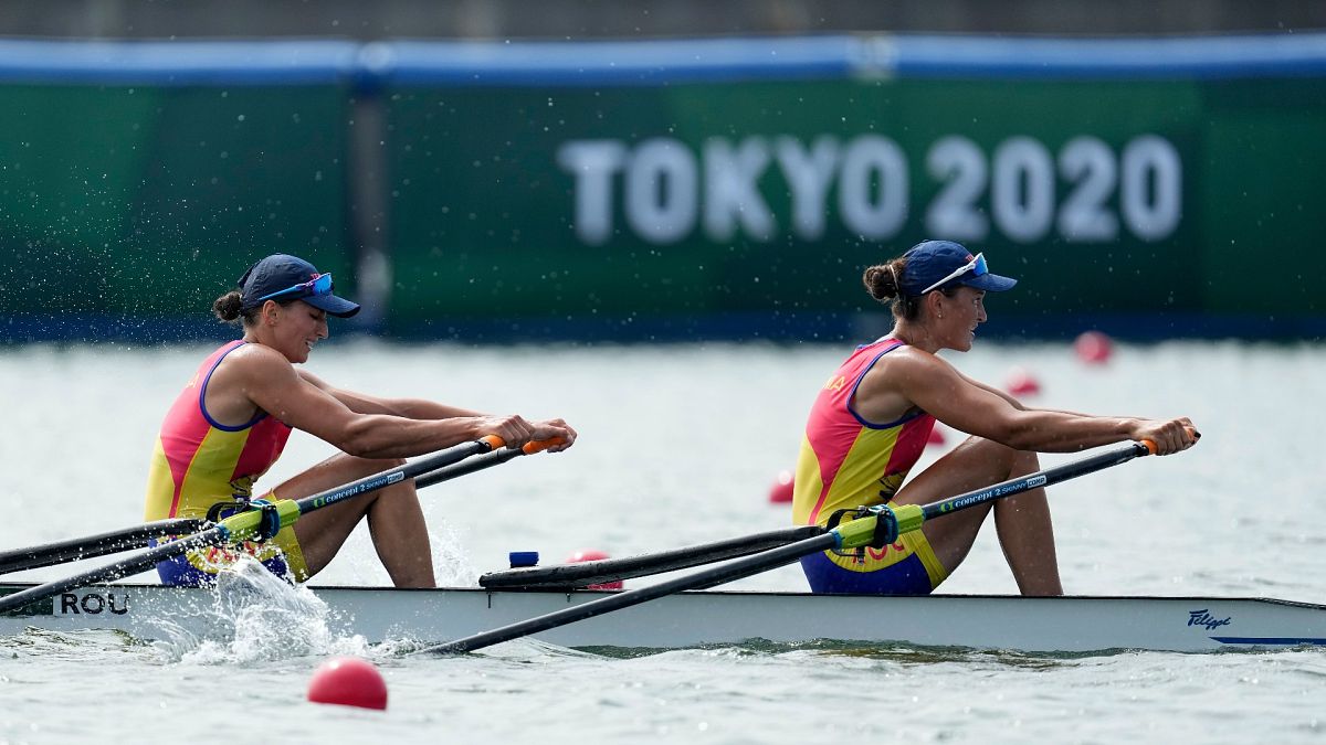 Ancuta Bodnar and Simona Radis of Romania compete in the women's rowing double sculls final at the 2020 Summer Olympics, July 28, 2021, in Tokyo, Japan. 