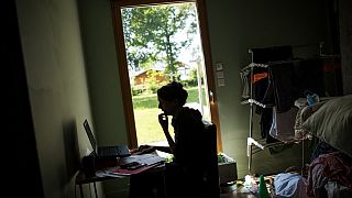 A woman works from home in Vertou, outside Nantes, France