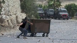 Palestinians, Israeli troops clash after funeral