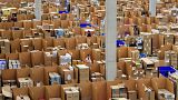 Amazon warehouse workers collect goods for thousands of purchase orders containing unrecyclable plastic