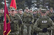 FILE: Members of the Kosovo Security Force (KSF) take part in a ceremony honouring  a Kosovo Liberation Army commander, Pristina, Monday, March 5, 2018.