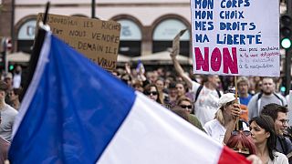 Anti-vaccine protesters march during a rally in Strasbourg, Saturday, July 17, 2021. 