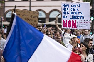 Anti-vaccine protesters march during a rally in Strasbourg, Saturday, July 17, 2021.