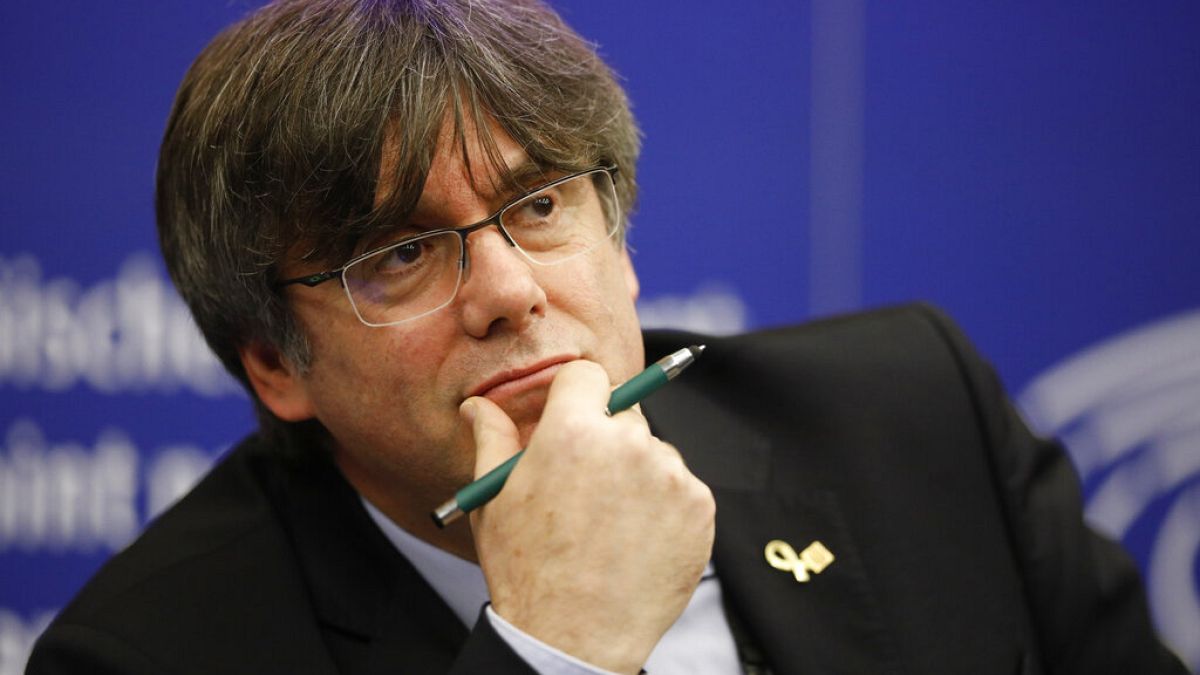 Catalan leader Carles Puigdemont reacts during a press conference at the European Parliament in Strasbourg