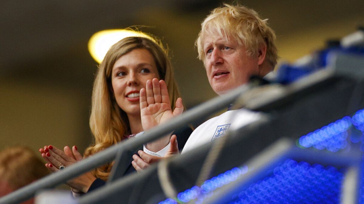 British Prime Minister Boris Johnson and his wife Carrie watch the Euro 2020 soccer championship final between England and Italy at Wembley stadium in London.