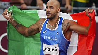 Lamont Marcell Jacobs, of Italy, celebrates after winning the final of the men's 100-meters at the 2020 Summer Olympics, Sunday, Aug. 1, 2021, in Tokyo.