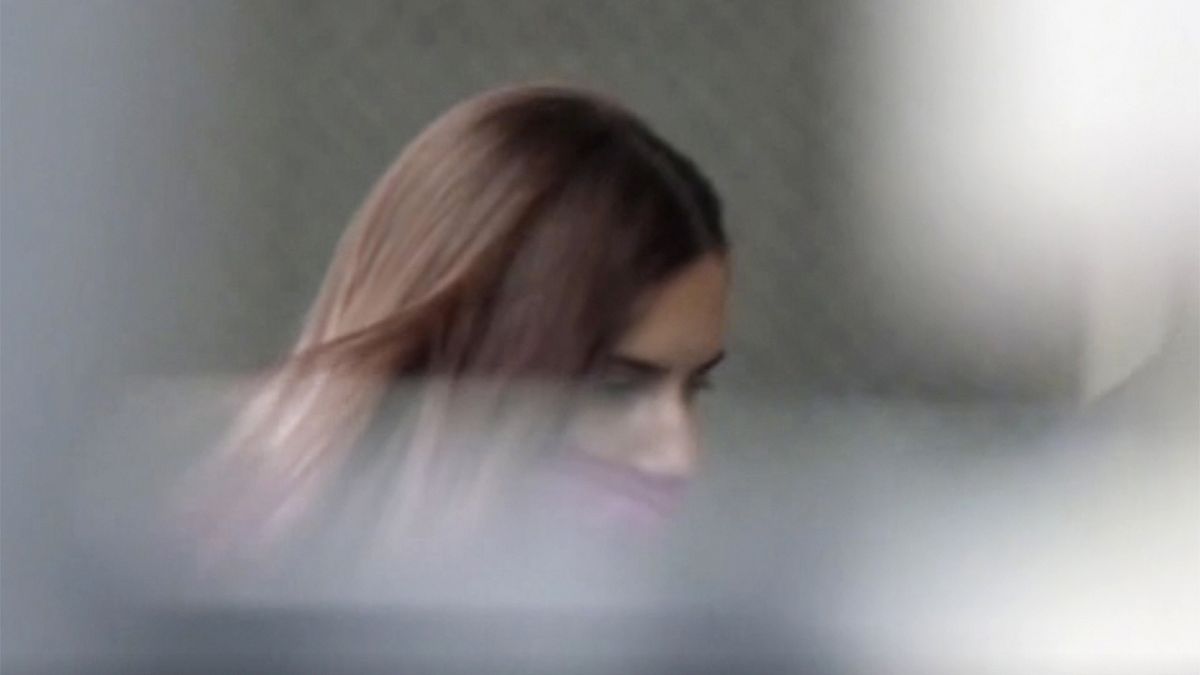 In this image made from video provided by NTV, Belarus Olympic sprinter Krystsina Tsimanouskaya enters the Polish embassy in Tokyo, Japan, Monday, Aug. 2, 2021.