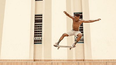 A member of the Surf Ghana collective skateboarding in Accra