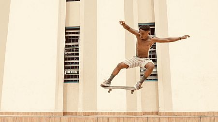 A member of the Surf Ghana collective skateboarding in Accra