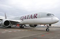  In this Jan. 15, 2015 photo, a new Qatar Airways Airbus A350 approaches the gate at the airport in Frankfurt, Germany.