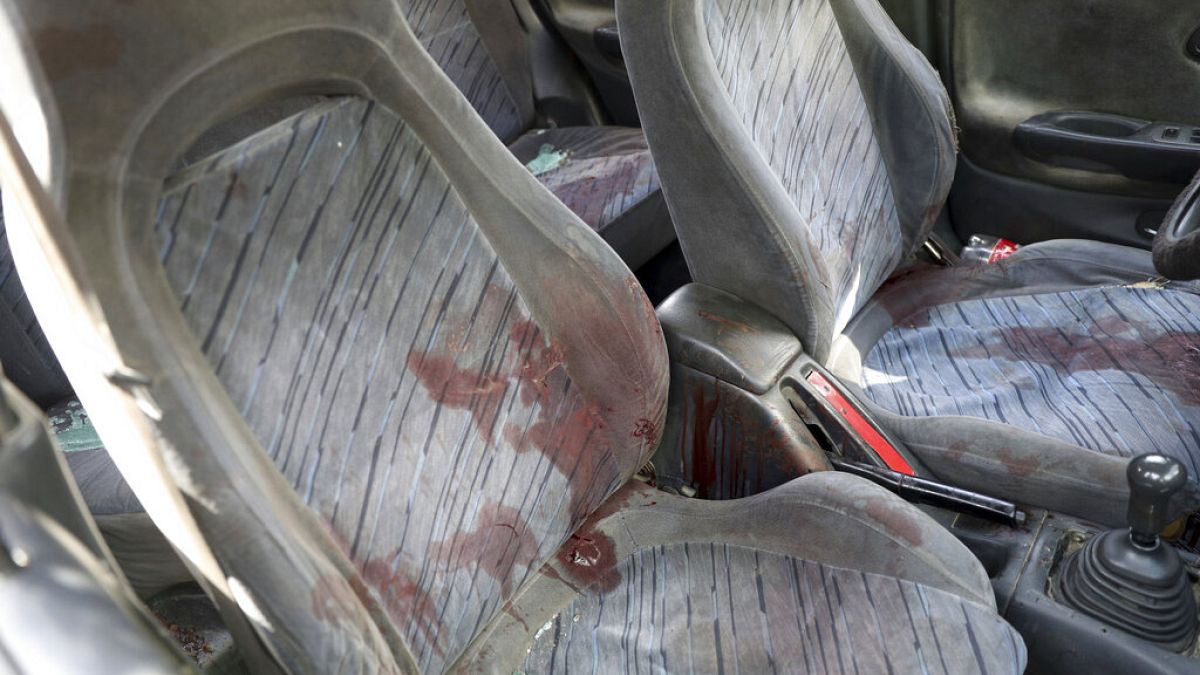 Blood stains is seen inside a car after a director of Afghanistan's Government Information Media Center Dawa Khan Menapal was shot dead in Kabul