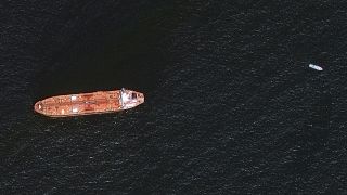 In this image provided by Maxar Technologies, the oil tanker Mercer Street is seen off the coast of Fujairah, United Arab Emirates, Wednesday Aug. 4, 2021.