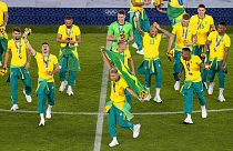 Played of Brazil celebrate after winning the gold medal defeating Spain 2-1 in the men's soccer final match
