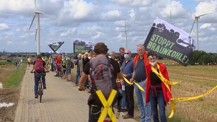 Activists form a 4-kilometer human chain around Garzweiler mine in Germany