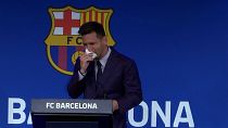 Lionel Messi fought back tears as he began a press conference