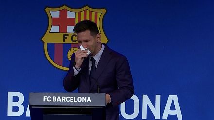 Lionel Messi fought back tears as he began a press conference