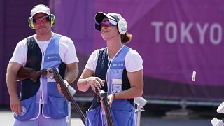 Gian Marco Berti, left, Alessandra Perilli, both of San Marino won silver in the mixed team trap at the Tokyo 2020 Summer Olympics .