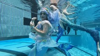 Shimmering tails and swimming feats: welcome to the world's biggest mermaid convention
