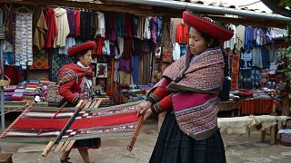 Native Inca women weaving on the streets of Peru's Sacred Valley, a practice that can often be commercialised for the wrong reasons