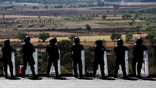 Police are battling a pandemic of violence in Michoacan state, Mexico.