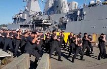 New Zealand navy personnel welcome colleagues aboard warship with powerful haka