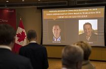 صورتان للكنديين مايكل كوفريغ، ومايكل سبافور في السفارة الكندية في بكين.