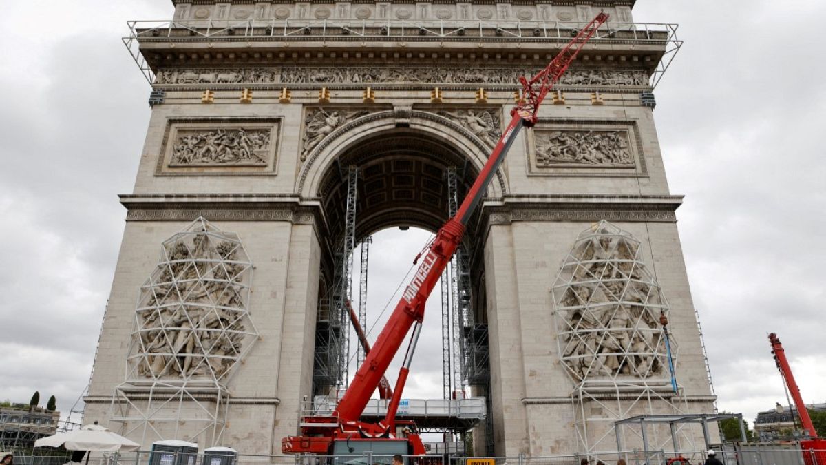 The Arc de Triomphe, home to the the tomb of the Unknown Soldier, being prepared before the wrapping of the monument, as part of a tribute for late bulgarian artist Christo.