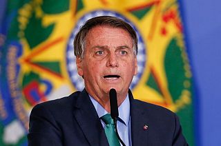 In this file photo taken on August 05, 2021 Brazil's President Jair Bolsonaro speaks during a ceremony at the Planalto Palace in Brasilia.