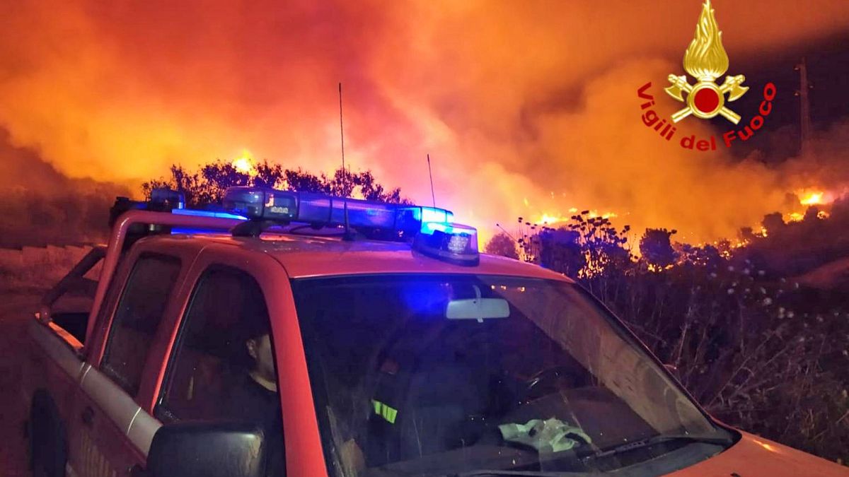 A view of a fire near Mandas, in the south of Sardinia, Italy, in the early hours of Thursday, Aug. 12, 2021