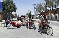 Taliban fighters patrol inside the city of Ghazni, southwest of Kabul, Afghanistan, Thursday, Aug. 12, 2021. 
