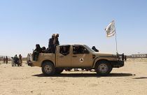 Taliban fighters patrol inside the city of Ghazni, southwest of Kabul