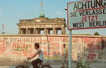The graffiti-covered Communist wall close to the Brandenburg Gate in Berlin, sometime in 1988.