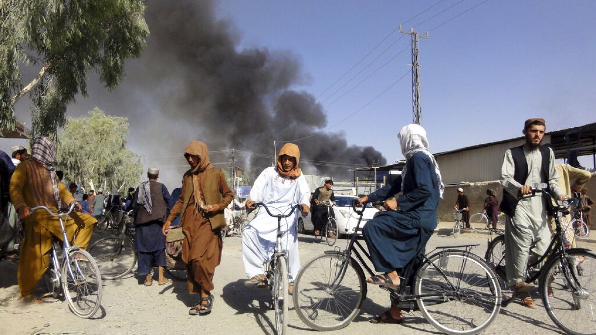 Smoke rises after fighting between the Taliban and Afghan security personnel, in Kandahar, southwest of Kabul, Afghanistan, Thursday, Aug. 12, 2021.