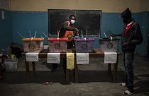 A man casts his ballot at a polling station in Lusaka on August 12, 2021 as Zambians elect their next president.