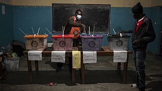 A man casts his ballot at a polling station in Lusaka on August 12, 2021 as Zambians elect their next president.