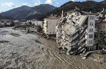 An aerial photo shows destroyed buildings after floods and mudslides killed about two dozens of people, in Bozkurt town of Kastamonu province, Friday, Aug. 13, 2021