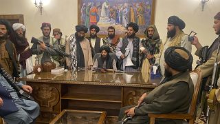 Taliban fighters take control of Afghan presidential palace after the Afghan President Ashraf Ghani fled the country, in Kabul, Afghanistan, Aug. 15, 2021.