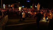more than 9,000 people gather for torchlight procession